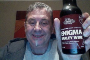 Looking old, worn out and a bit fuzzy here I am brandishing the beer, like a shield. 