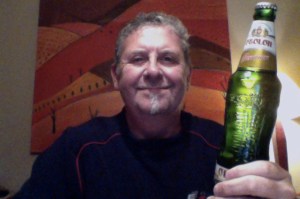 Wooly man drinks cold beer